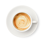 Top view of latte coffee in white cup